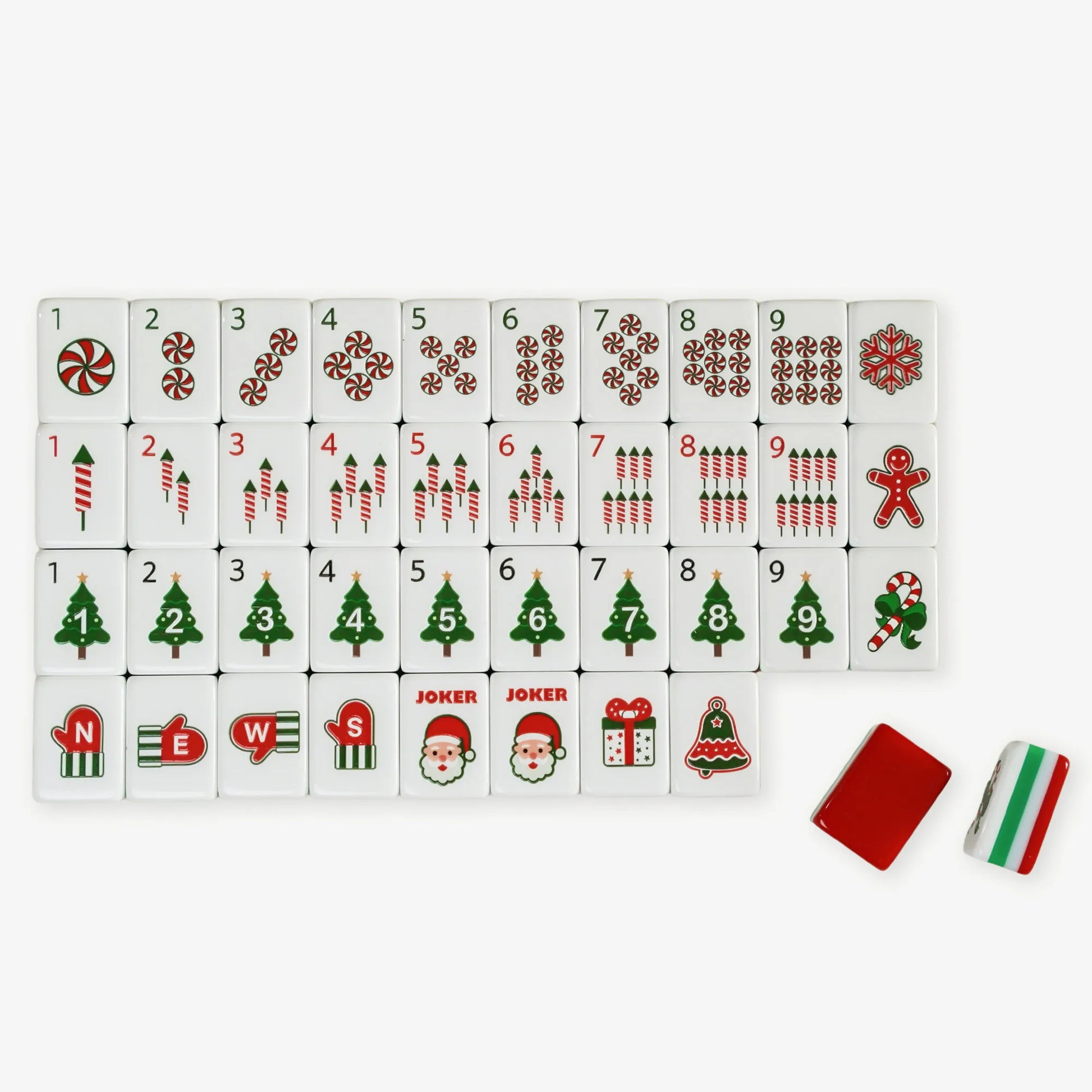 Set of Christmas-themed dominoes with various symbols on a white background