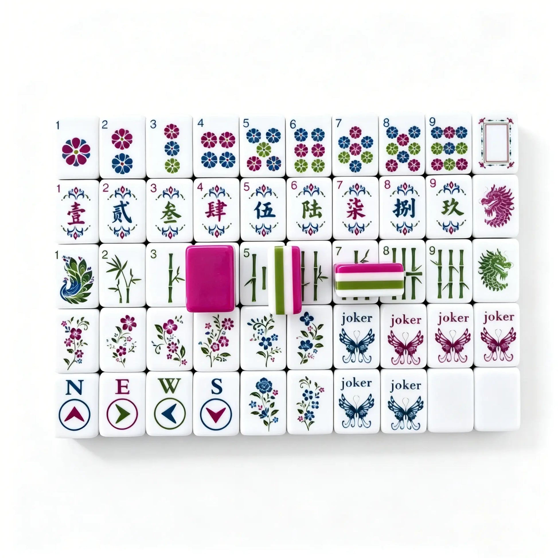 Full tile face layout of the Enchanted Butterfly Garden American Mahjong set, displaying compass winds, filigree crak characters, and a sample of the magenta triple-layer backing.