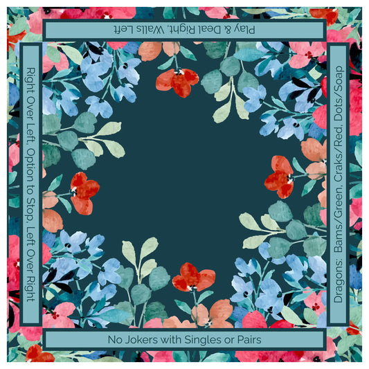 Deep teal American Mahjong mat with a watercolor floral border in red and blue, featuring printed guides for the Charleston and Dragon suits.